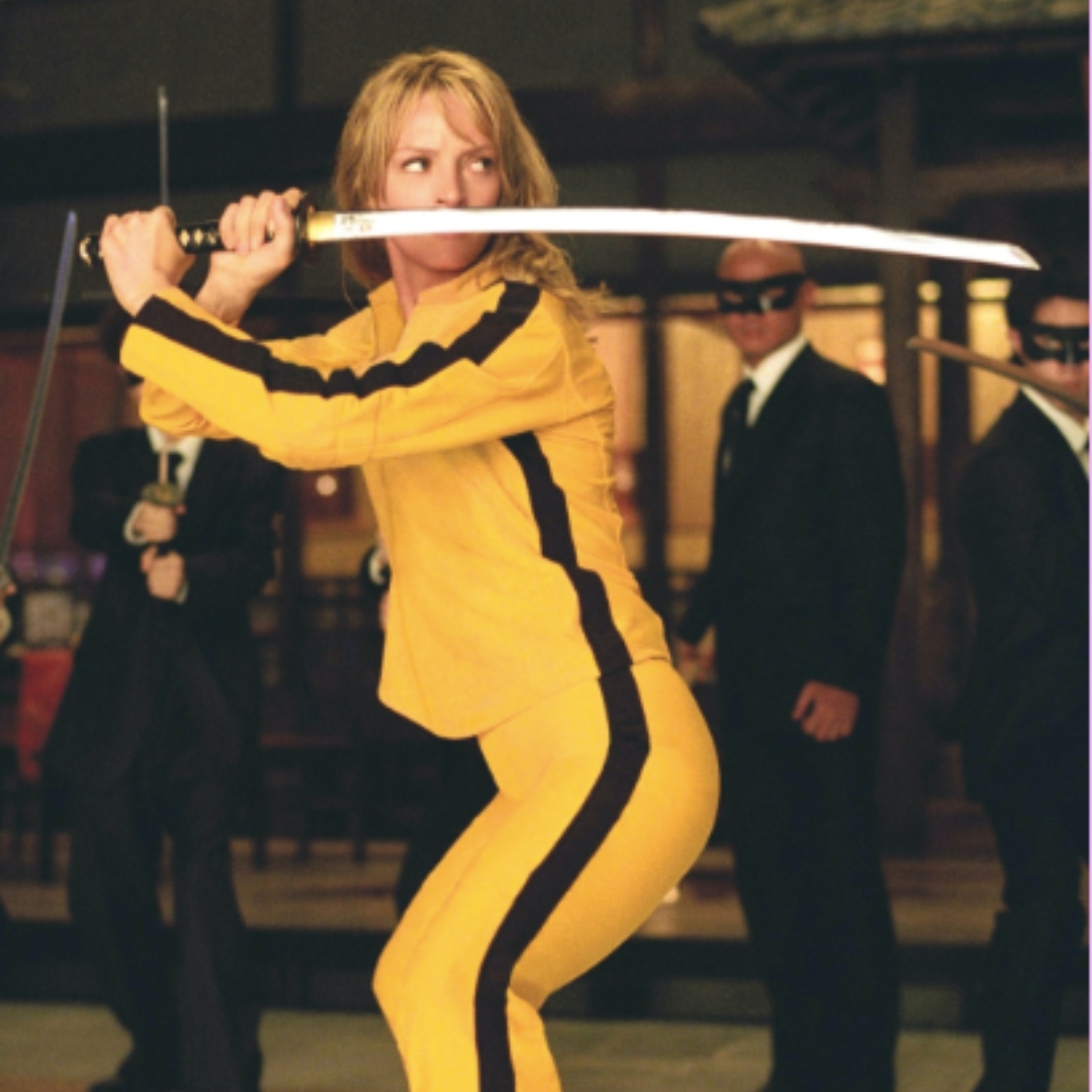 uma thurman wears a yellow tracksuit and onitsuka tiger mexico 66 sneakers in Kill Bill